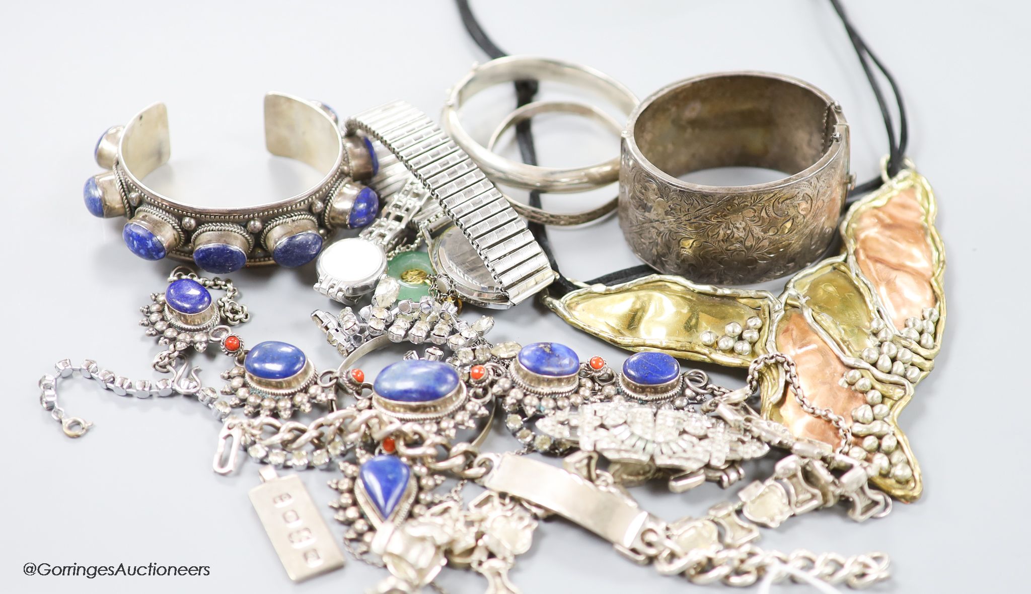 A collection of mixed silver and other costume jewellery.